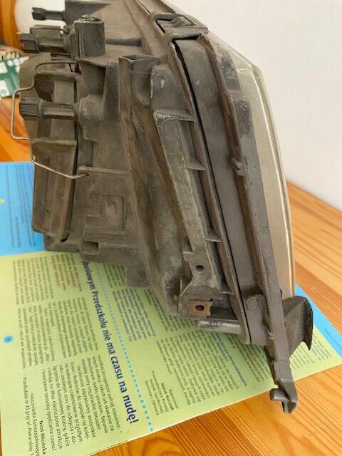 Oryginalny prawy reflektor Mercedes w 124 - Bosch