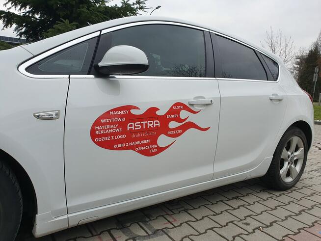 oznaczenia taxi Kraków cenniki herby magnesy numery boczne