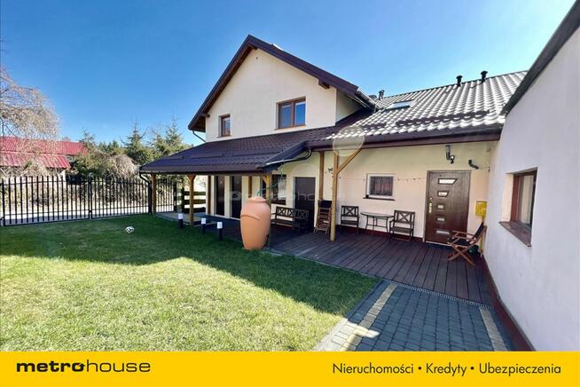 Dwa domy z linią brzegową Jezioraka Szałkowo