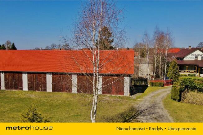 Dwa domy z linią brzegową Jezioraka Szałkowo