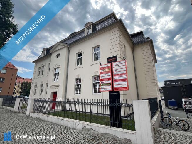 Działka zabudowana budynkiem biurowym