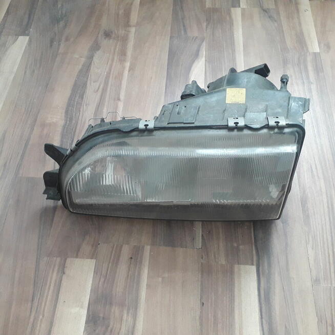 Oryginalny reflektor kierowcy Bosch Ford Scorpio Mk1