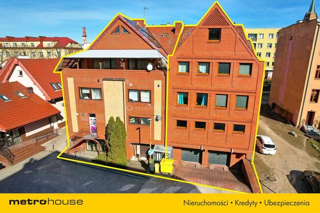 * Budynek mieszkalno-usługowy w centrum Olecka *