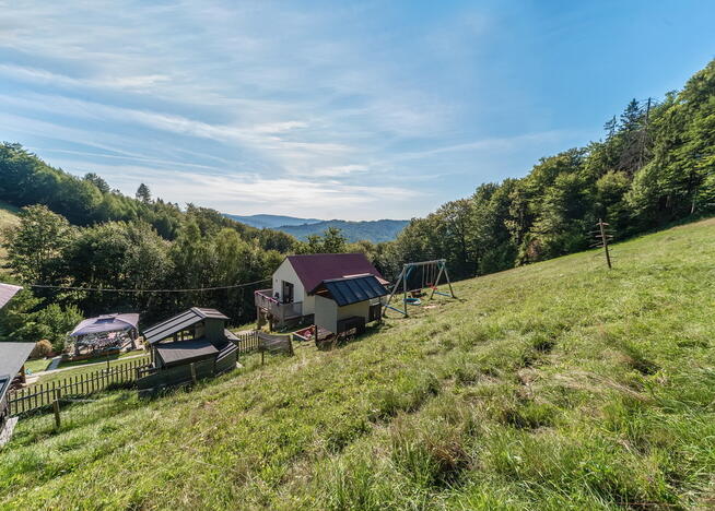 Działka z dwoma domami 680 m n.p.m