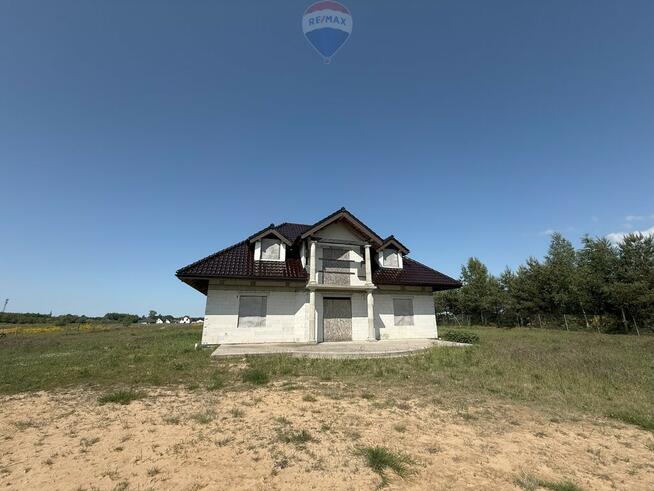 Dom z dużą działką na sprzedaż w Charzynie