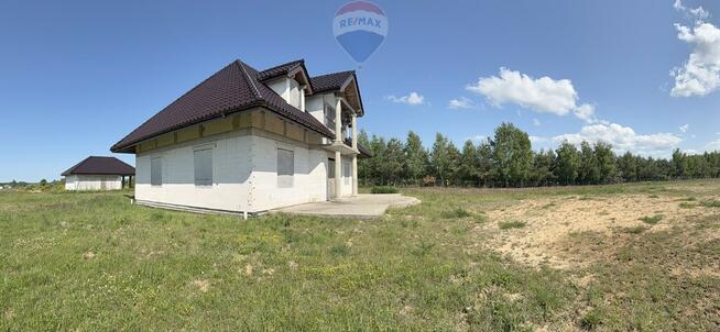 Dom z dużą działką na sprzedaż w Charzynie