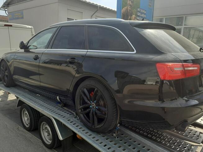 Pomoc drogowa 24/7 laweta transport holowanie