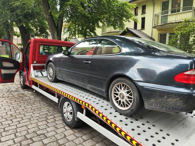 Pomoc drogowa 24/7 laweta transport holowanie