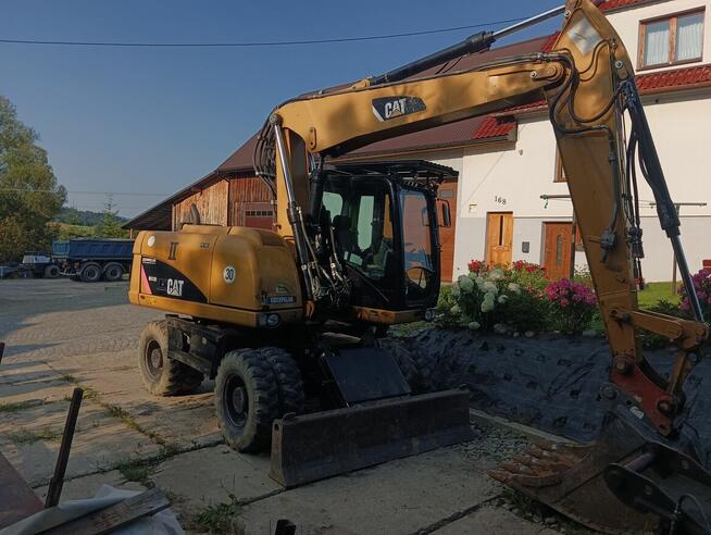 Caterpillar m313d koparka