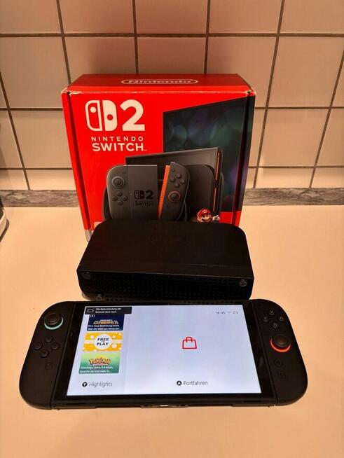 Nintendo Switch 2 stan bardzo dobry z kompletem