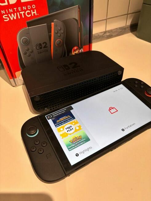 Nintendo Switch 2 stan bardzo dobry z kompletem