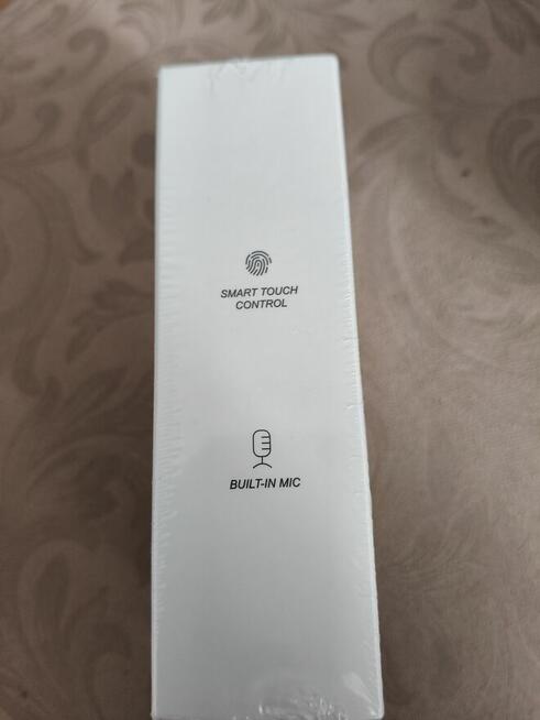 Bezprzewodowe słuchawki typu OWS (Open Wearable Stereo)