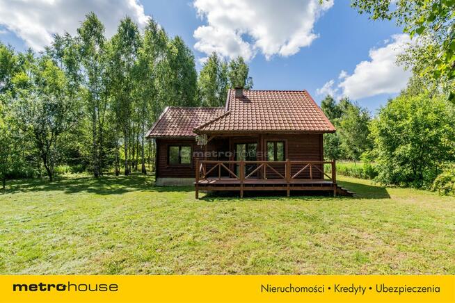 Przytulny dom w pięknej okolicy nad jeziorem.