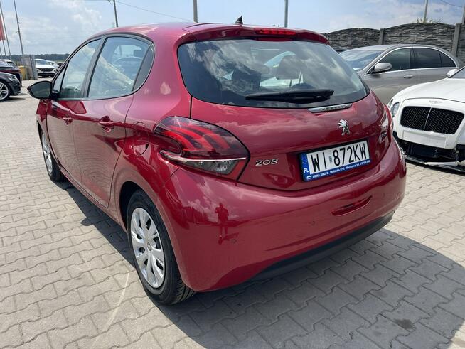 Peugeot 208 Salon PL Klimatronik Czujniki park.