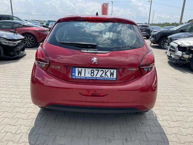 Peugeot 208 Salon PL Klimatronik Czujniki park.