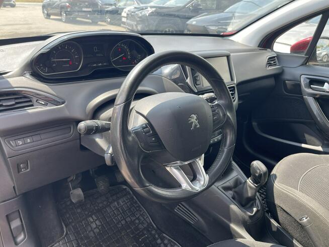 Peugeot 208 Salon PL Klimatronik Czujniki park.