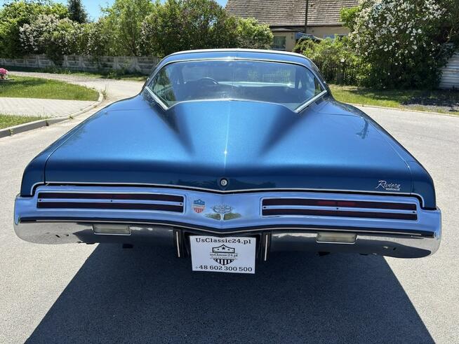 Buick Riviera 1973 – V8 455, automat, granat / biały vinyl