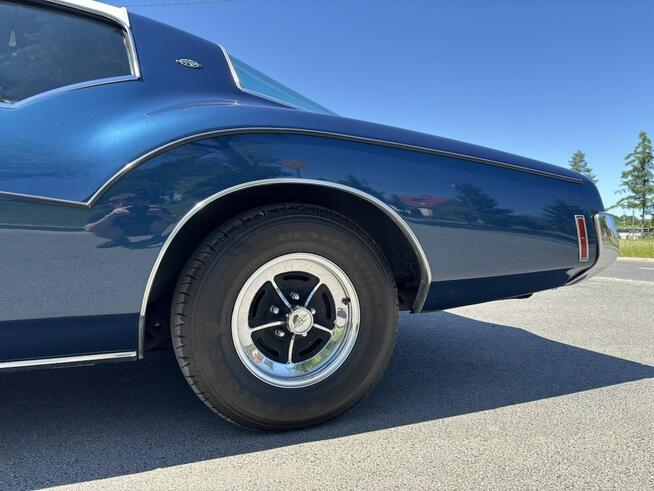 Buick Riviera 1973 – V8 455, automat, granat / biały vinyl