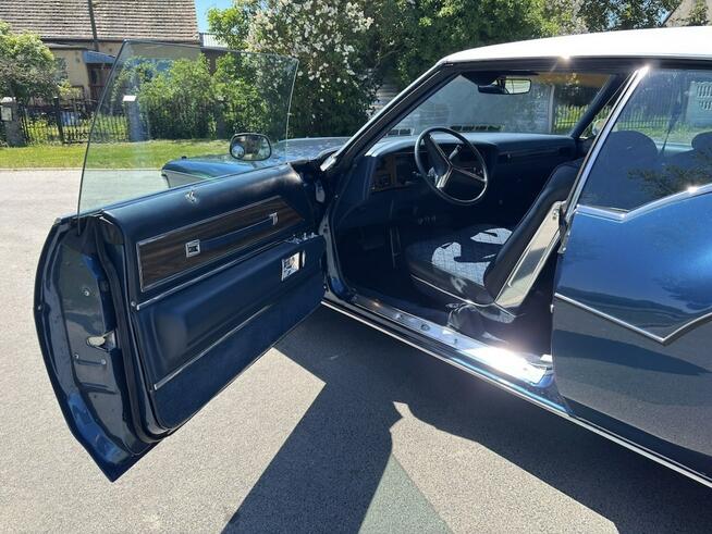 Buick Riviera 1973 – V8 455, automat, granat / biały vinyl