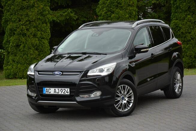 Ford Kuga Panorama AWD Skóry Bi-Xenon Ledy Sony Navi Kamera PDC Alu17" I Właśc.