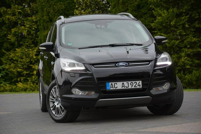 Ford Kuga Panorama AWD Skóry Bi-Xenon Ledy Sony Navi Kamera PDC Alu17" I Właśc.