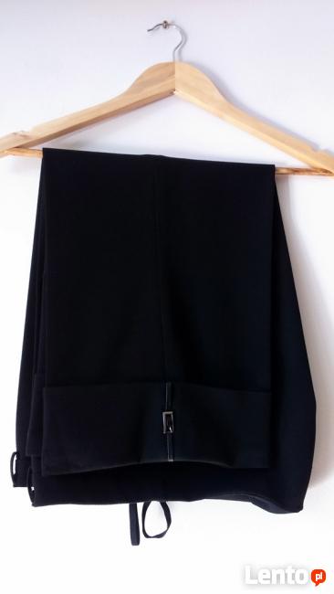 eleganckie spodnie za kolano M