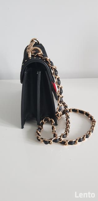 Praktycznie nowa kopertówka monari