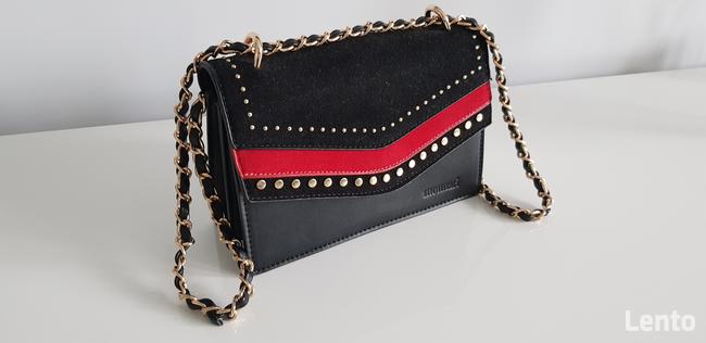 Praktycznie nowa kopertówka monari