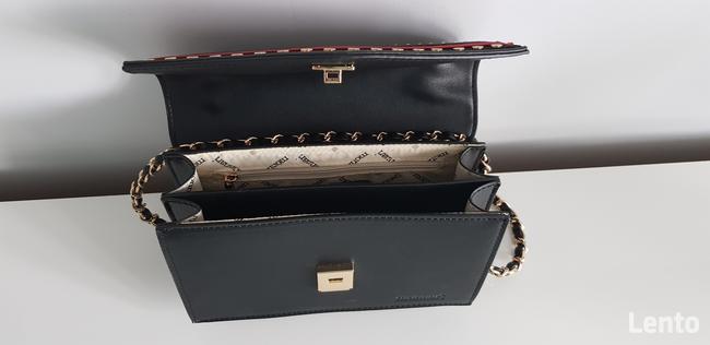 Praktycznie nowa kopertówka monari