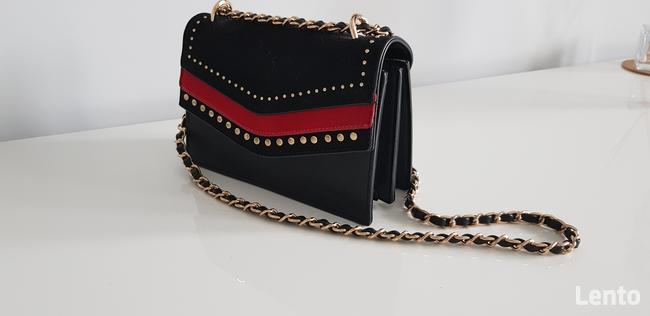 Praktycznie nowa kopertówka monari