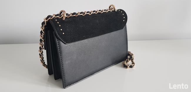 Praktycznie nowa kopertówka monari