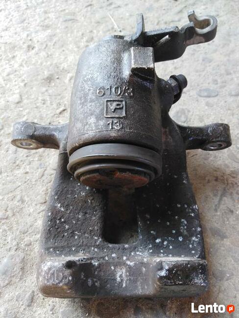 ZACISK HAMULCOWY LEWT TYŁ AUDI A3 VW GOLF V/VI TOURAN I