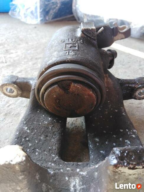 ZACISK HAMULCOWY LEWT TYŁ AUDI A3 VW GOLF V/VI TOURAN I