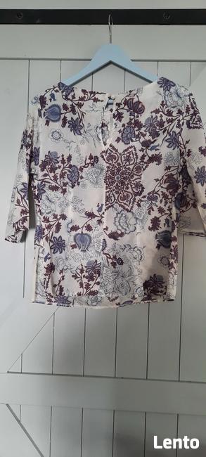 Bluzka Echo Made in Poland rozm 42(L) z żabotem i kwiatem