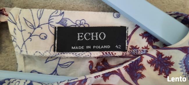 Bluzka Echo Made in Poland rozm 42(L) z żabotem i kwiatem