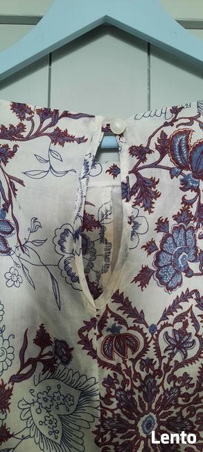 Bluzka Echo Made in Poland rozm 42(L) z żabotem i kwiatem