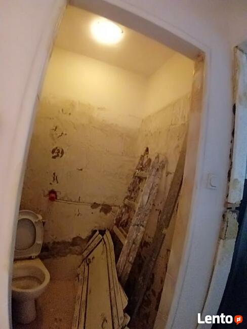 Układanie glazury , paneli Warszawa