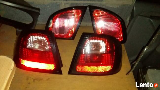 Części Nissan Primera P11 Lampy lusterka serwo pompa hamulco
