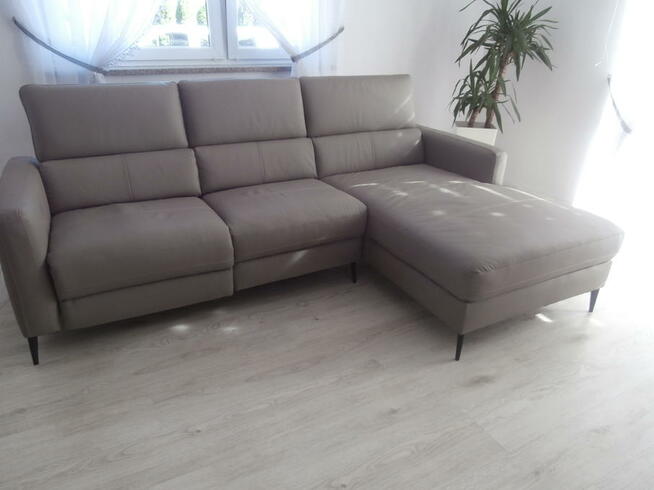 Skórzana szara sofa z funkcją relaksu