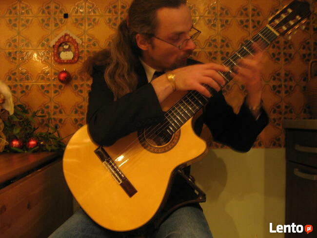 Wigilia 2025 przy gitarze Warszawa Wigilia Firmowa z gitarą.