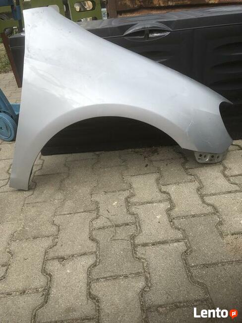 Błotnik Golf 6 prawy LA7W