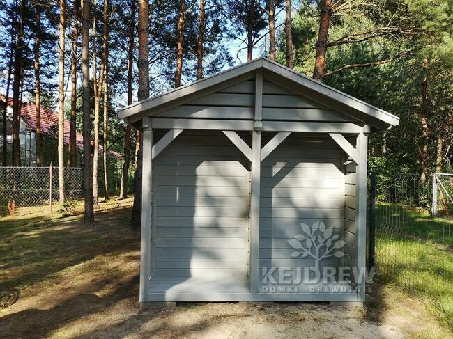 Garaż na motocykl z drewutnią i domkiem narzędziowym