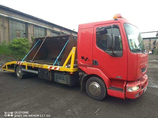 Holowanie Transport samochodów maszyn