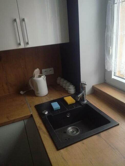 Mieszkanie przestronna kawalerka ciepła umeblowana