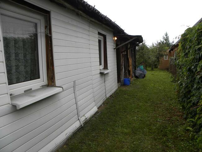 Dom z drewna przy Wiśle ul. Modrzycka w Dęblinie.