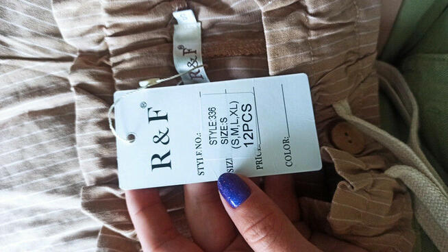 Nowe beżowe spodnie w paski z wysokim stanem