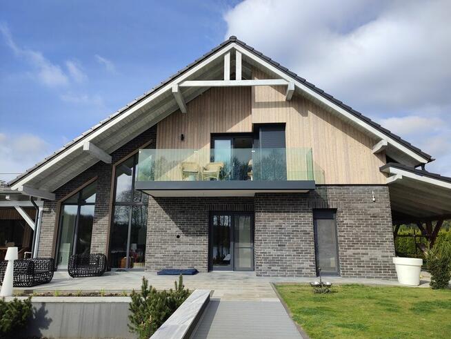Elewacja drewniana montaż konstrukcja i deski tarasowe