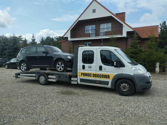 Holowanie pomoc drogowa laweta transport Giżycko Ryn Orzysz