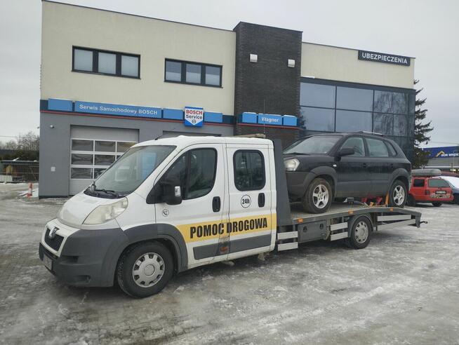 Auto laweta pomoc drogowa holowanie Giżycko