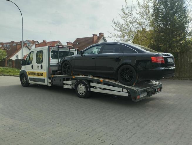 Holowanie pomoc drogowa laweta transport Giżycko Ryn Orzysz